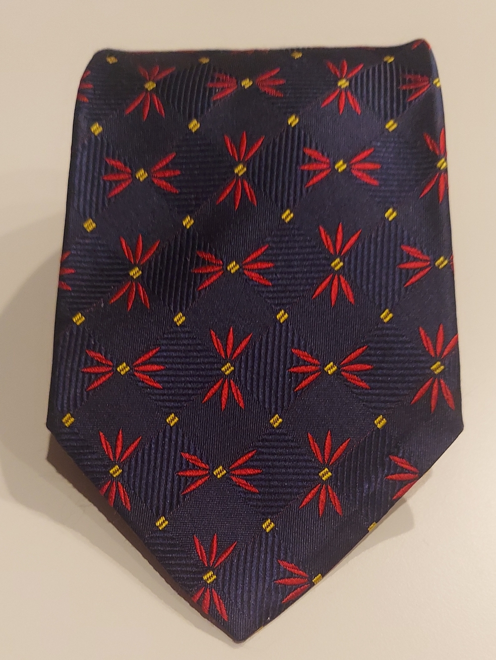Vintage Geoffrey Beene Silk Navy Tie with Red Floral Pattern and Yellow Accents
